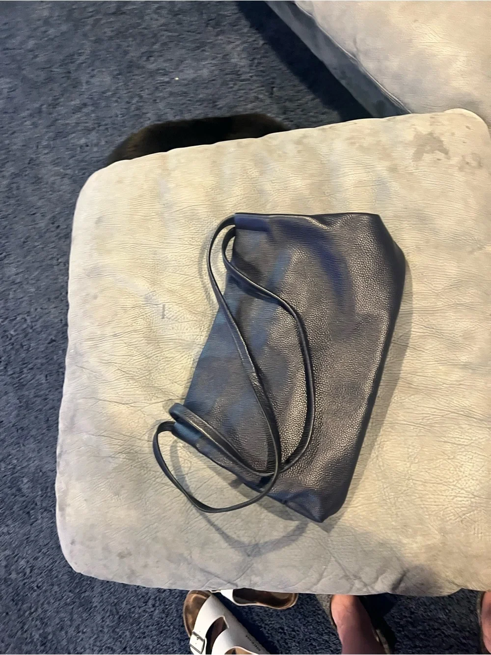 Elegant Black Leather Shoulder Bag with Front Zip Detail